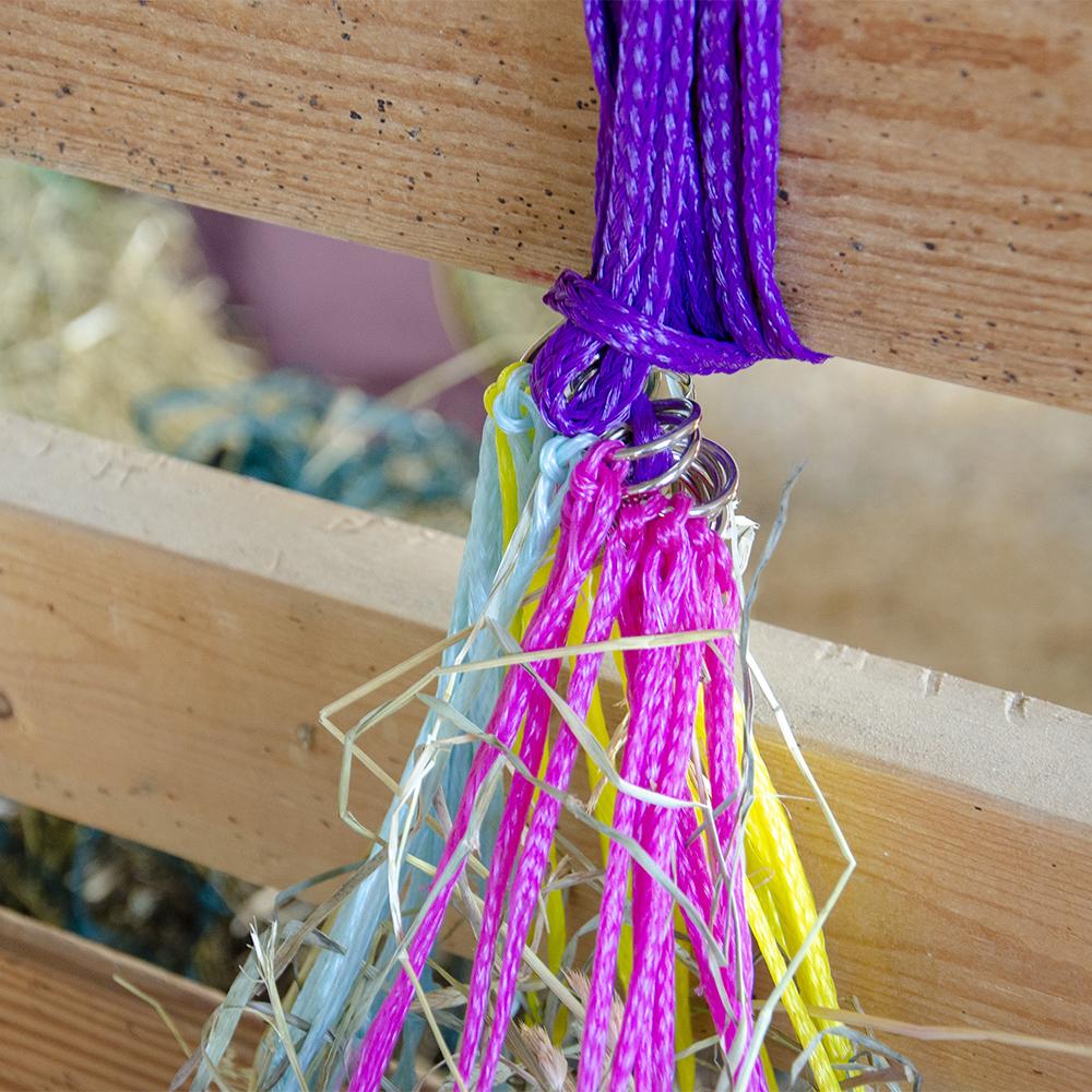 Hay net with slow feeding feature in Cotton Candy color